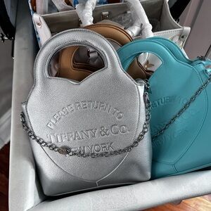 Brand new fashion bag. In silver or tan